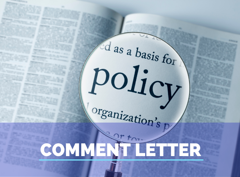 The word policy magnified over a textbook with