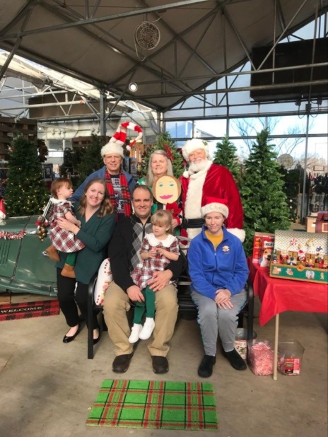 Judy Hodges with family at Christmas with Santa